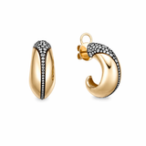 Pair of sculptural yellow gold hoop earrings with graduated pavé diamonds along the outer edge