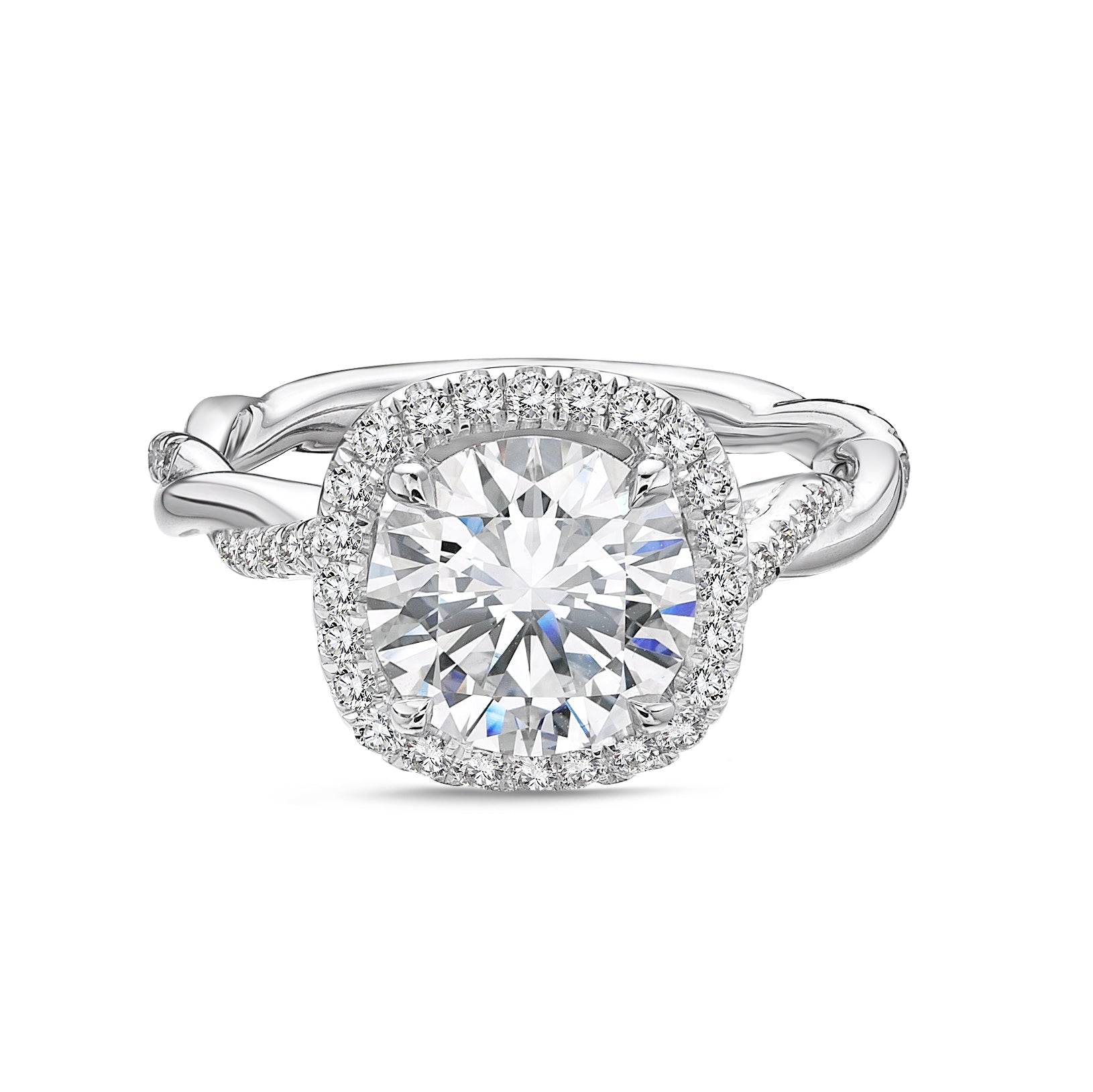 Round brilliant cut diamond engagement ring with a diamond halo and twisted pavé-set platinum band by Chantel Shafie Jewellery.