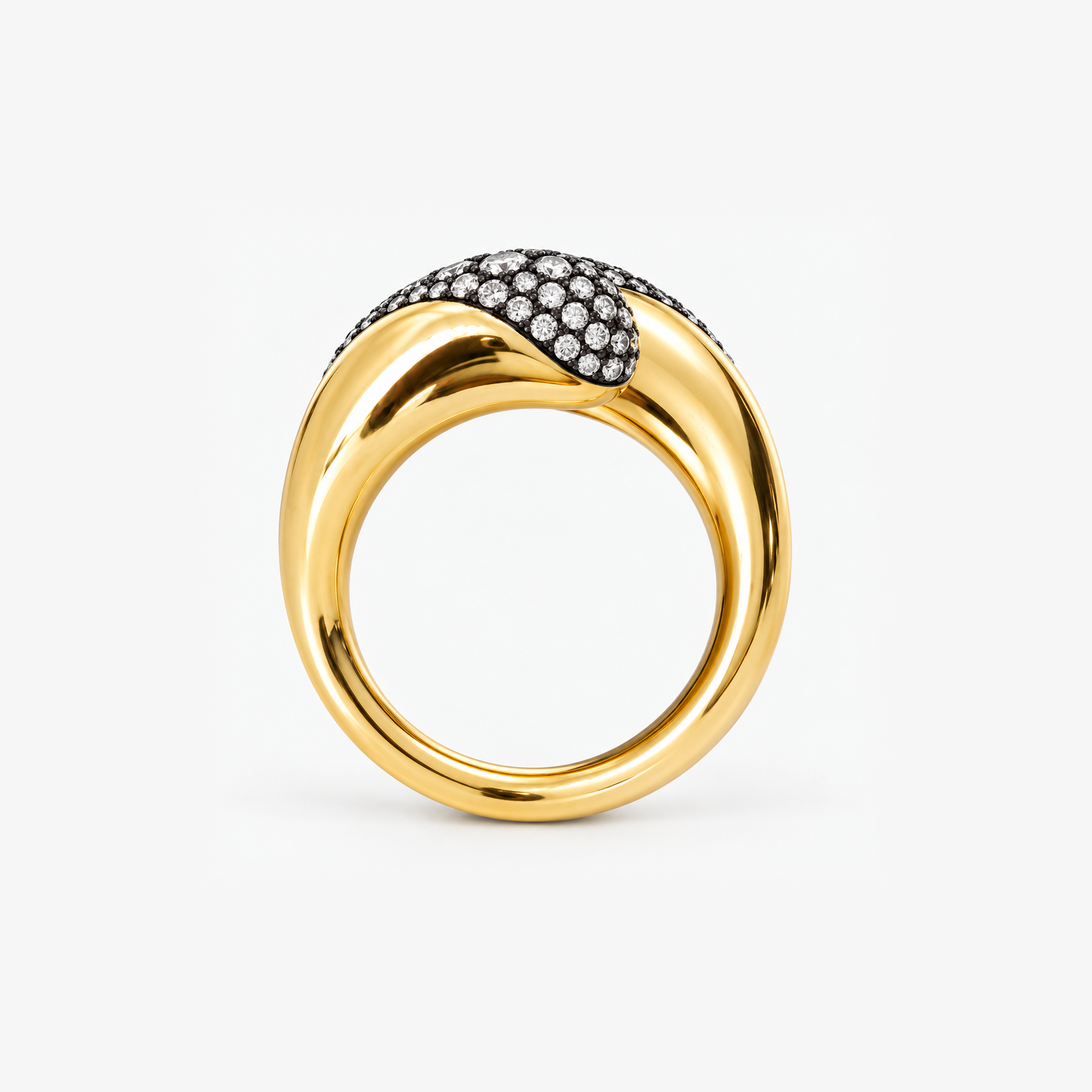 Side view of the Chantel Shafie Ravello ring with a domed pave of diamonds set in blackened gold on a polished yellow gold band